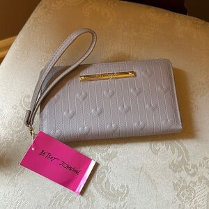 NWT Betsey Johnson lavender and pink embossed heart zip clutch, wallet